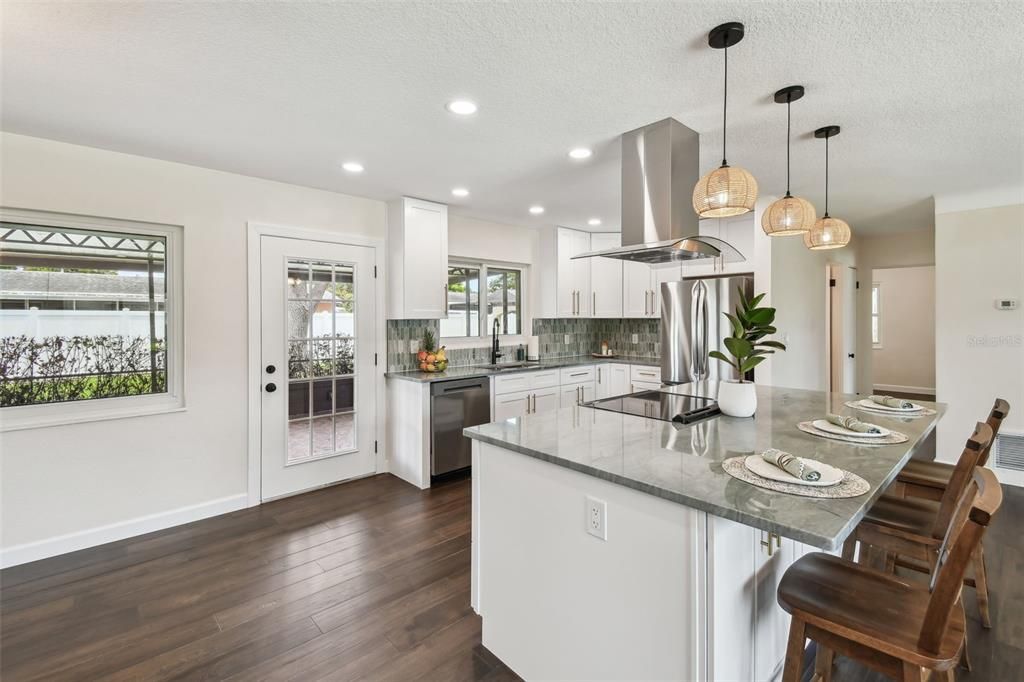 Interior, Kitchen, Pendant Lights, Recessed Lighting, Stainless Steel Appliances, Wood Texture Flooring