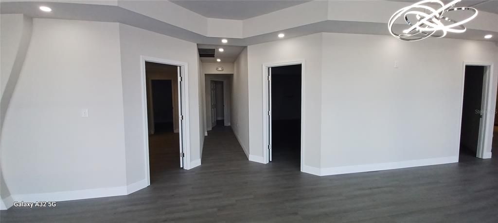 Empty room, Interior, Pendant Lights, Recessed Lighting, Wood Texture Flooring