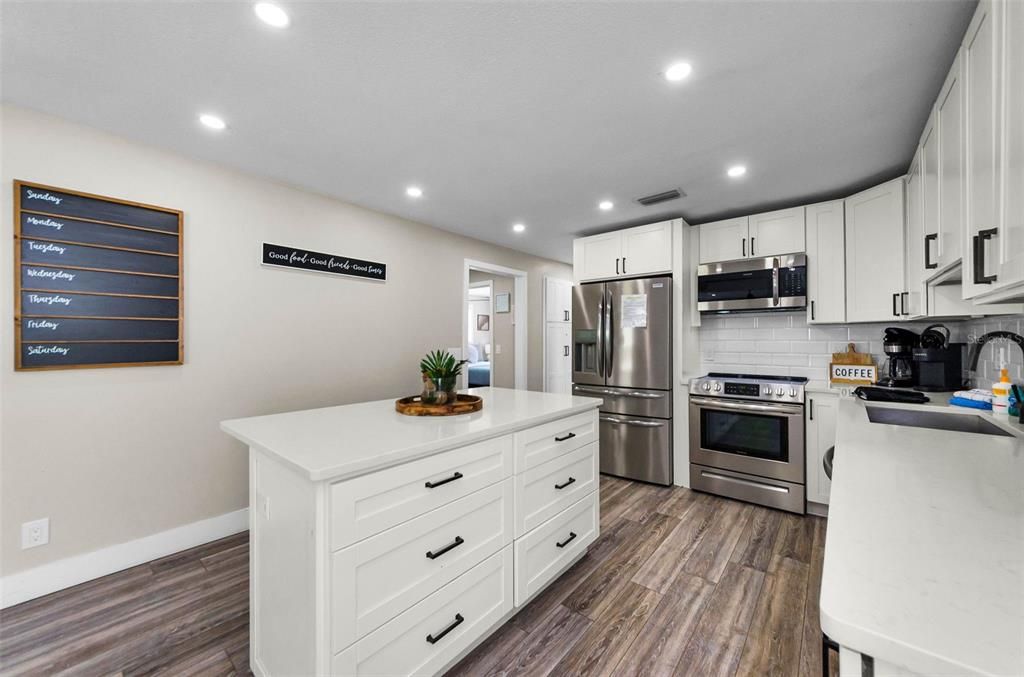 Interior, Kitchen, Recessed Lighting, Stainless Steel Appliances, Wood Texture Flooring