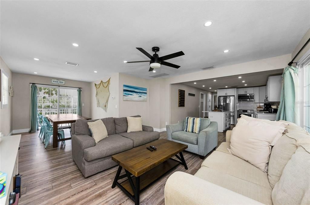 Dining room, Interior, Kitchen, Living room, Recessed Lighting, Stainless Steel Appliances, Wood Texture Flooring