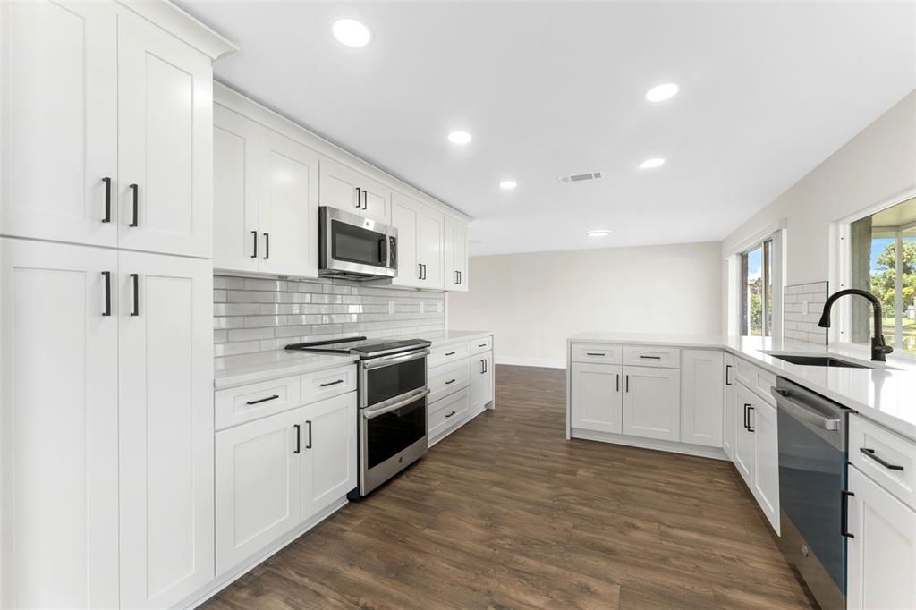 Interior, Kitchen, Recessed Lighting, Stainless Steel Appliances, Wood Texture Flooring