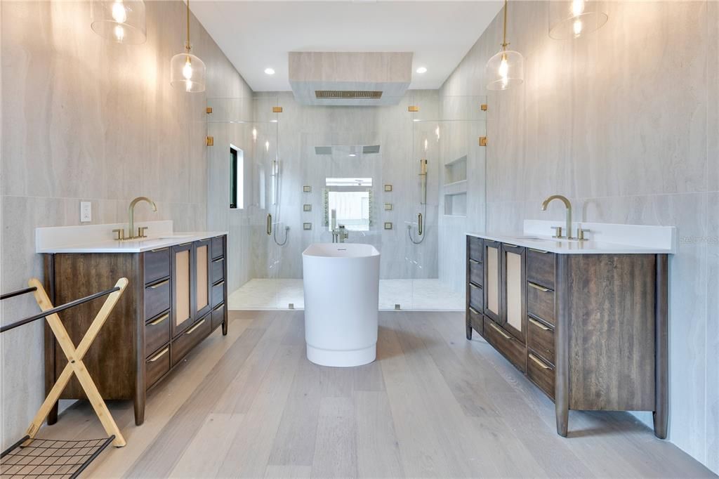 Bathroom, Dual Sink Vanities, Free Standing Baths, Glass Shower, Interior, Pendant Lights, Recessed Lighting, Wood Texture Flooring