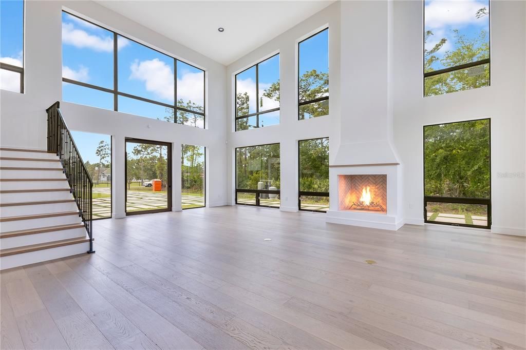 Fireplace, Interior, Sun Room, Wood Texture Flooring