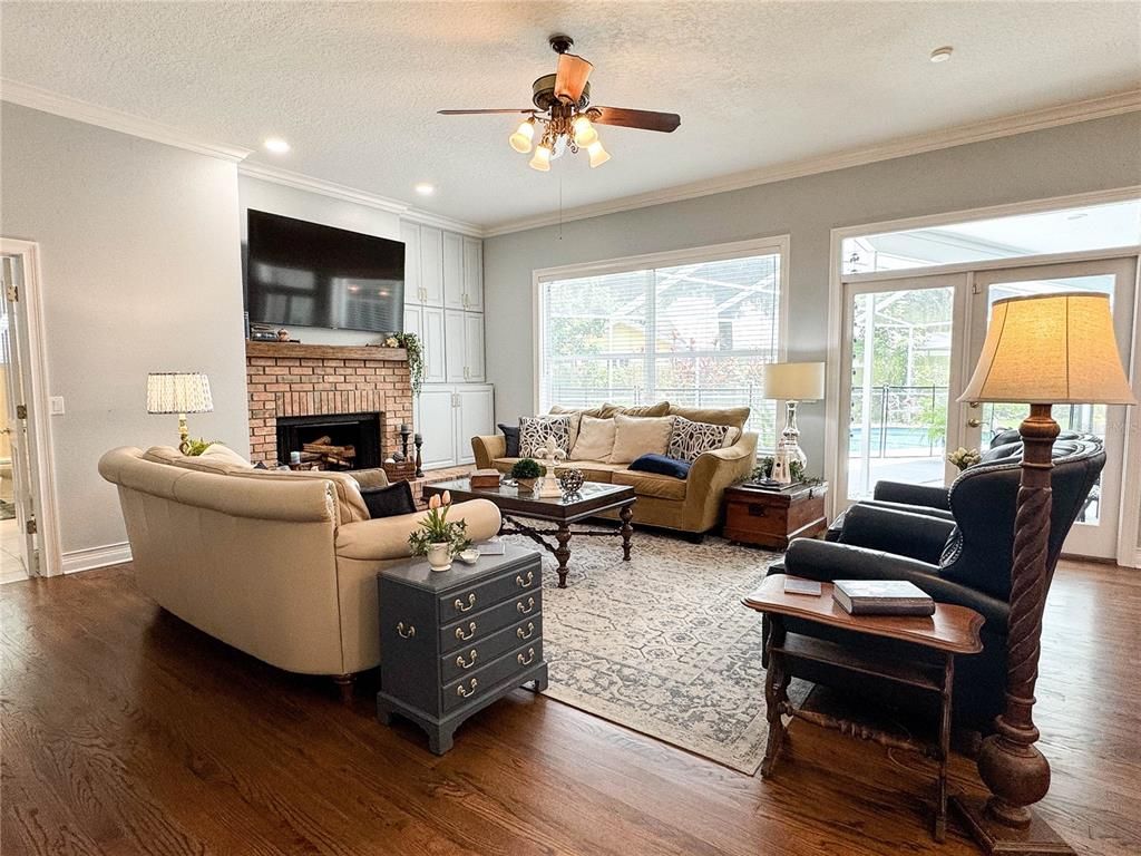 Fireplace, Interior, Living room, Recessed Lighting, Wood Texture Flooring
