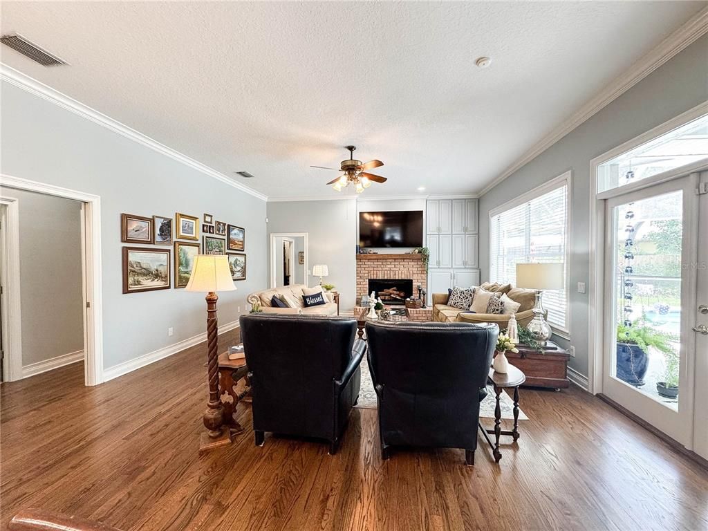Fireplace, Interior, Living room, Recessed Lighting, Wood Texture Flooring
