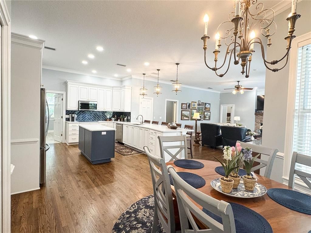 Chandelier, Dining room, Interior, Kitchen, Living room, Pendant Lights, Recessed Lighting, Wood Texture Flooring