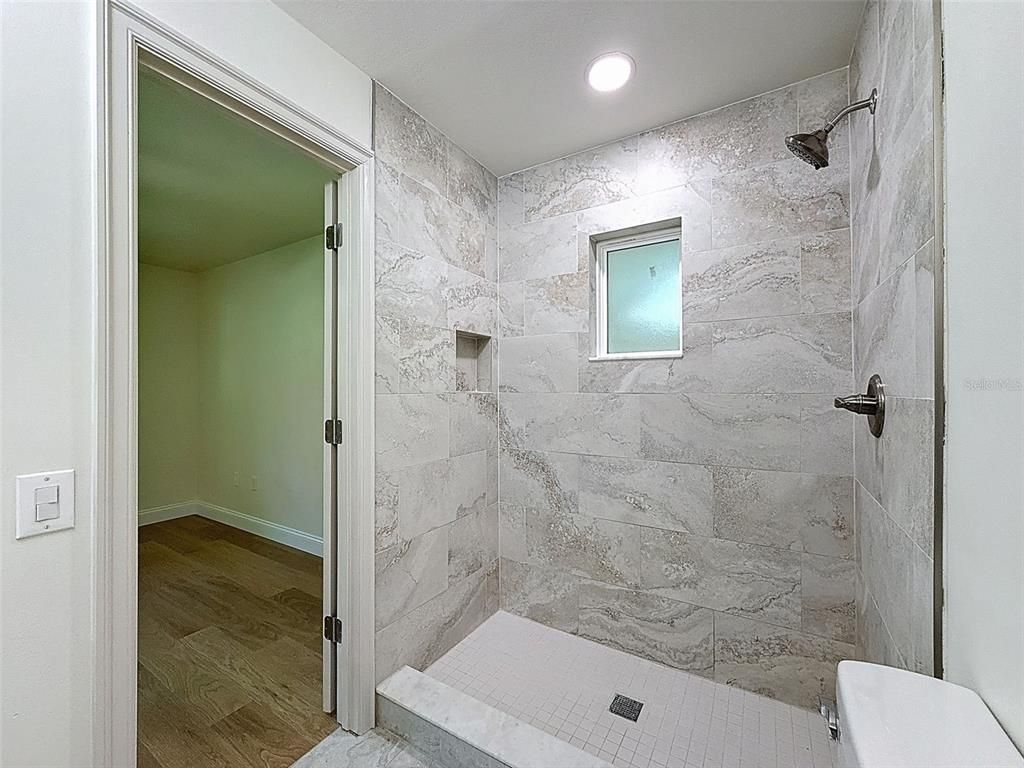 Bathroom, Interior, Marble Walls, Recessed Lighting, Wood Texture Flooring