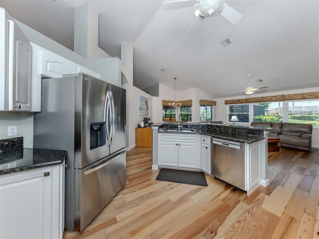 Chandelier, Interior, Kitchen, Pendant Lights, Stainless Steel Appliances, Wood Texture Flooring