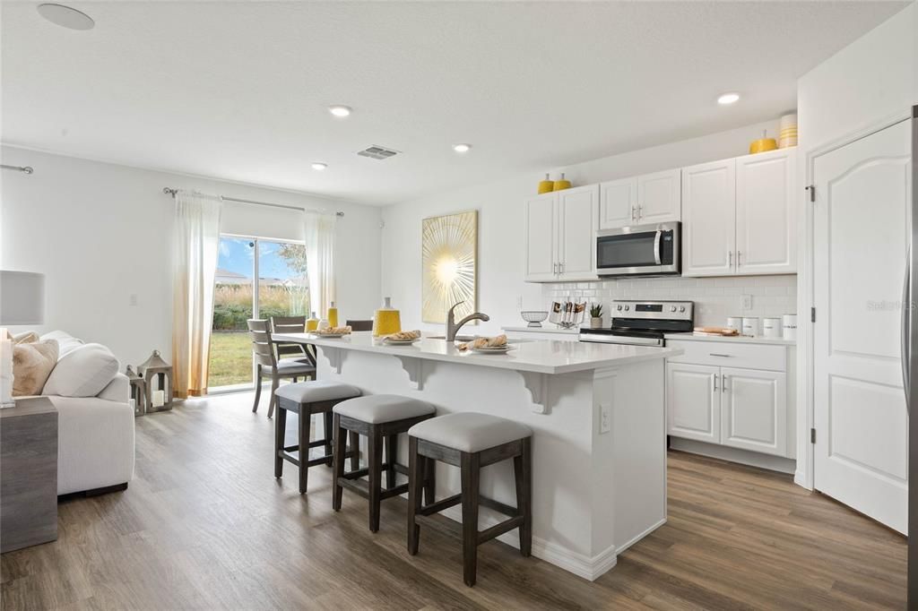 Dining room, Interior, Kitchen, Recessed Lighting, Stainless Steel Appliances, Wood Texture Flooring