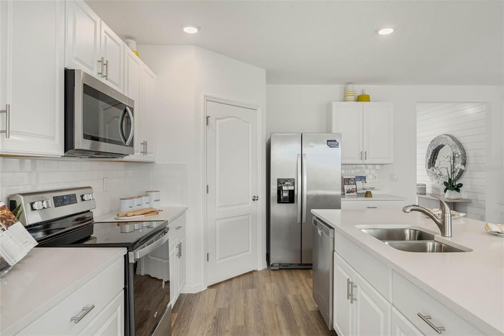 Interior, Kitchen, Recessed Lighting, Stainless Steel Appliances, Wood Texture Flooring