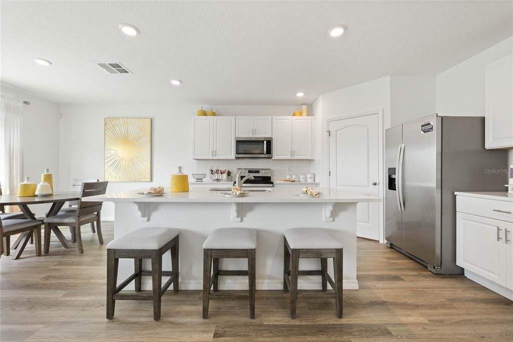 Dining room, Interior, Kitchen, Recessed Lighting, Stainless Steel Appliances, Wood Texture Flooring