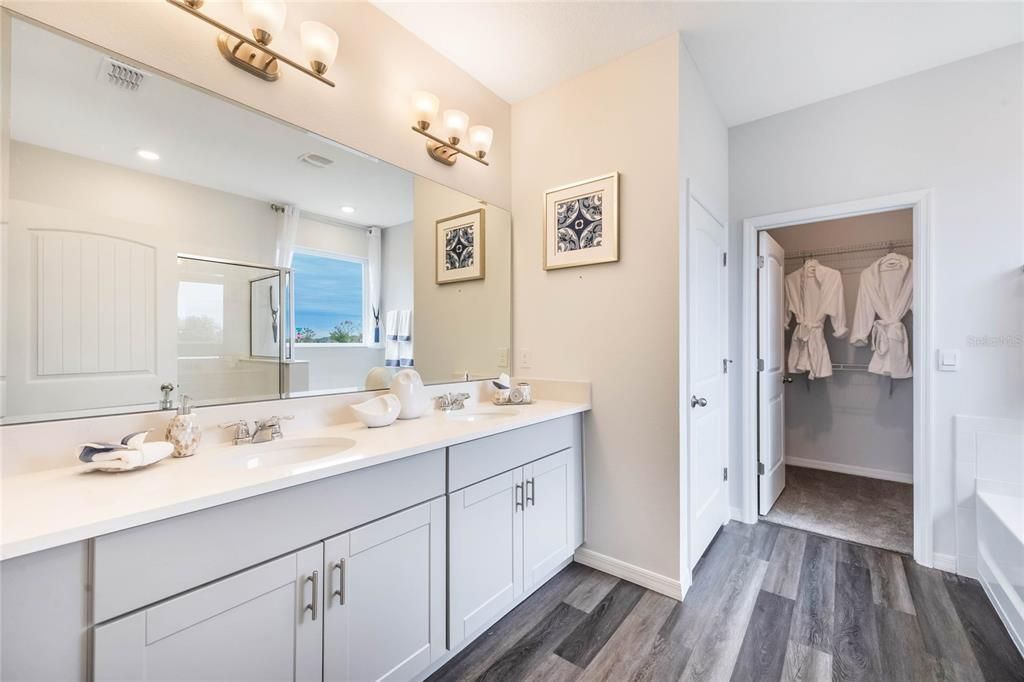 Bathroom, Dual Sink Vanities, Interior, Recessed Lighting, Walk-in Closets, Wood Texture Flooring