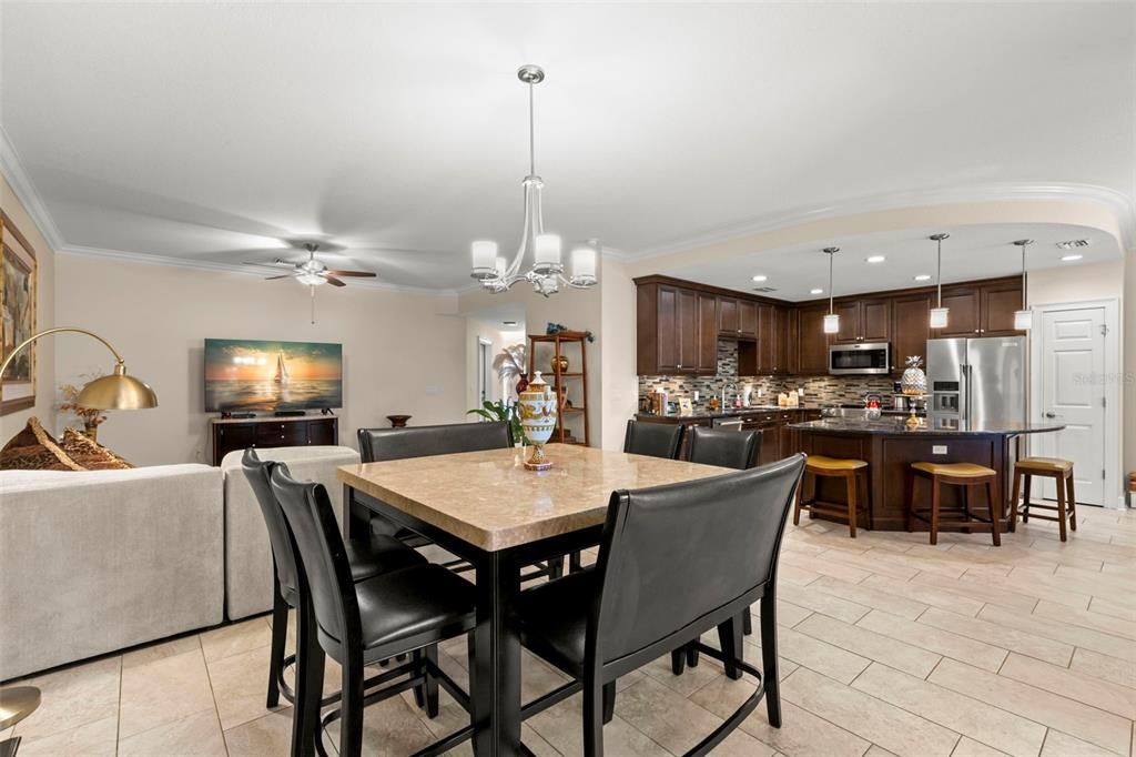 Chandelier, Dining room, Interior, Kitchen, Pendant Lights, Recessed Lighting, Stainless Steel Appliances