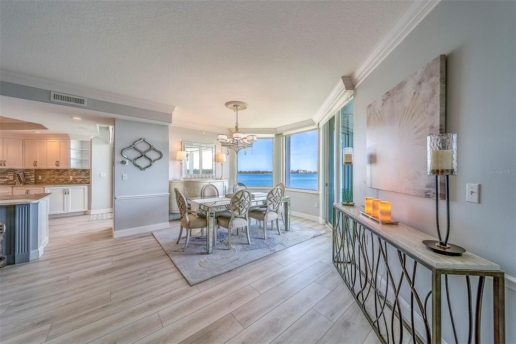 Chandelier, Dining room, Interior, Kitchen, Pendant Lights, Recessed Lighting, Water, Wood Texture Flooring