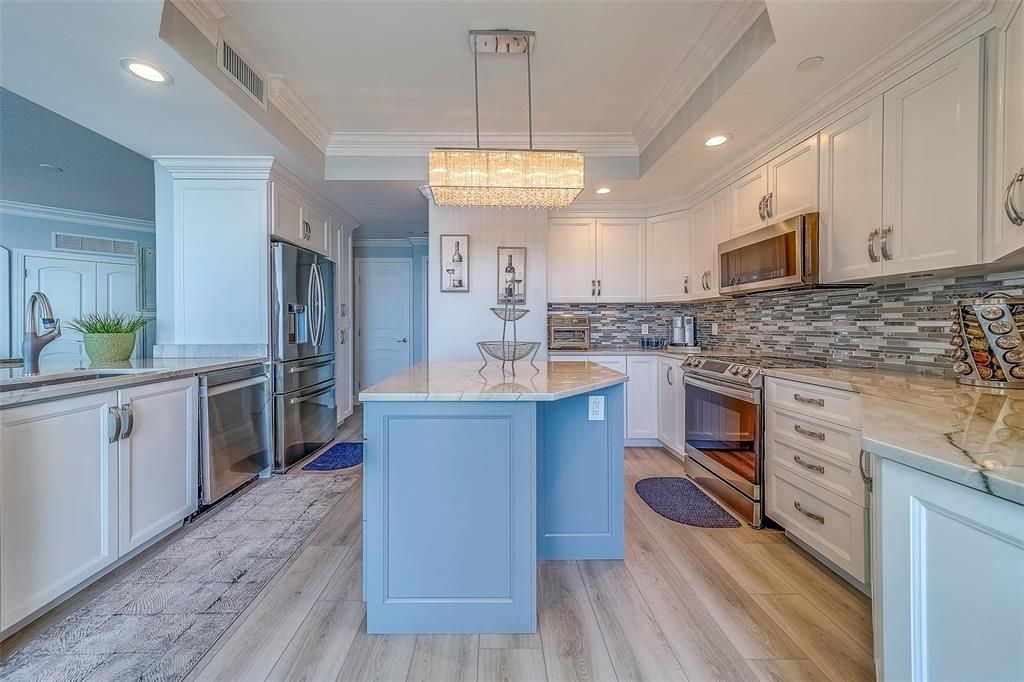 Chandelier, Interior, Kitchen, Recessed Lighting, Stainless Steel Appliances, Wood Texture Flooring