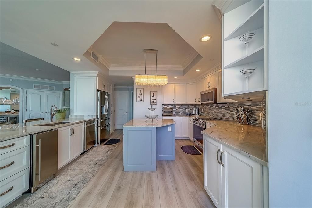 Chandelier, Interior, Kitchen, Recessed Lighting, Stainless Steel Appliances, Wood Texture Flooring