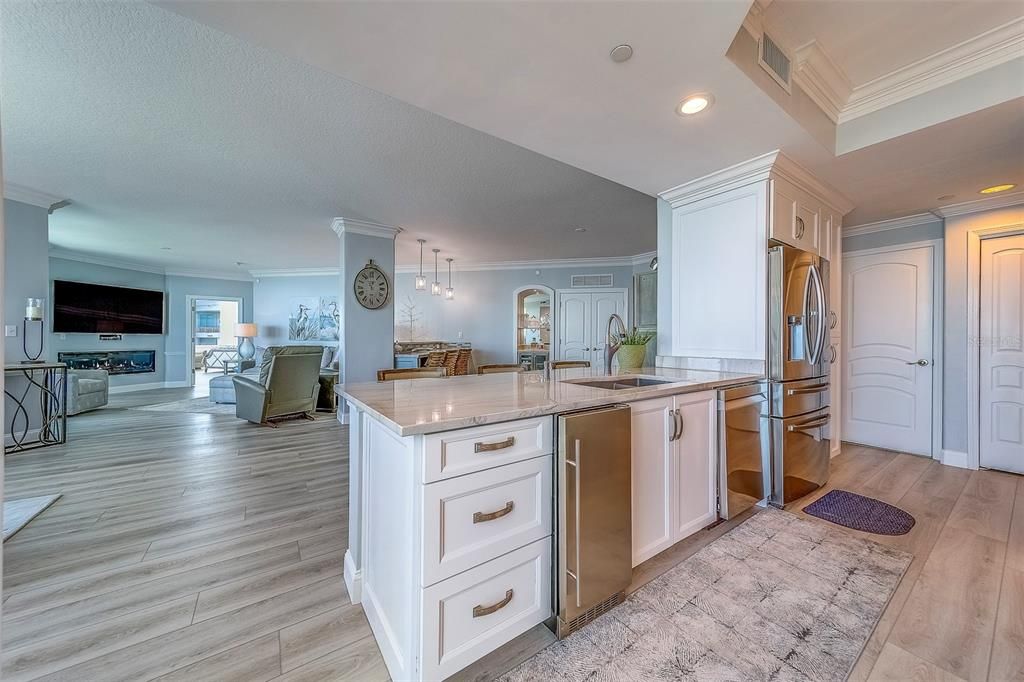 Fireplace, Interior, Kitchen, Living room, Pendant Lights, Recessed Lighting, Wood Texture Flooring