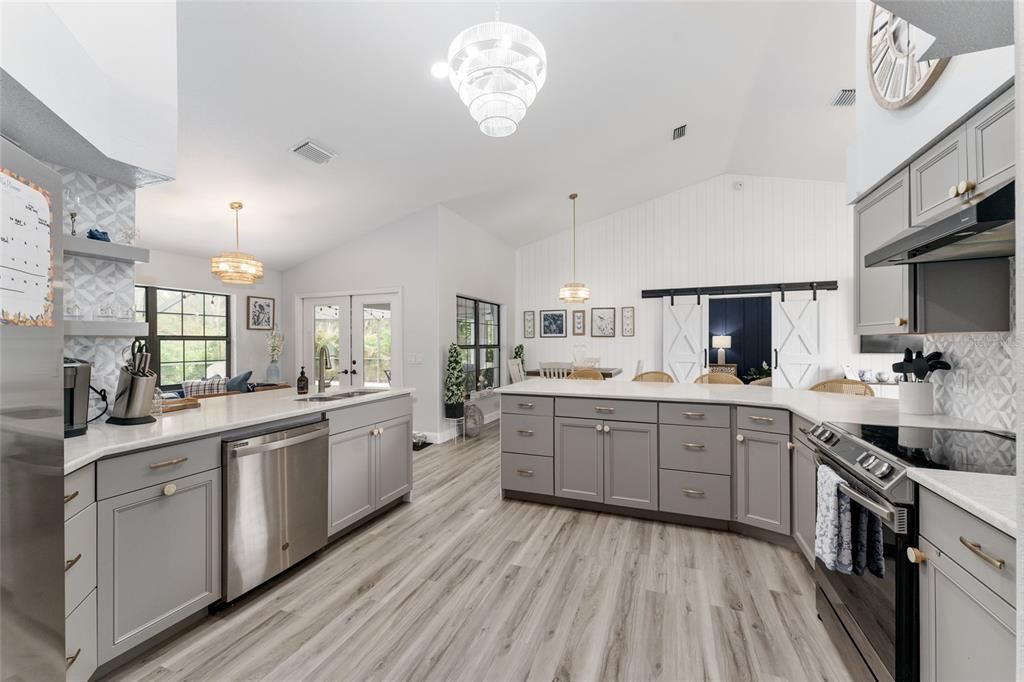 Chandelier, Interior, Kitchen, Pendant Lights, Stainless Steel Appliances, Wood Texture Flooring