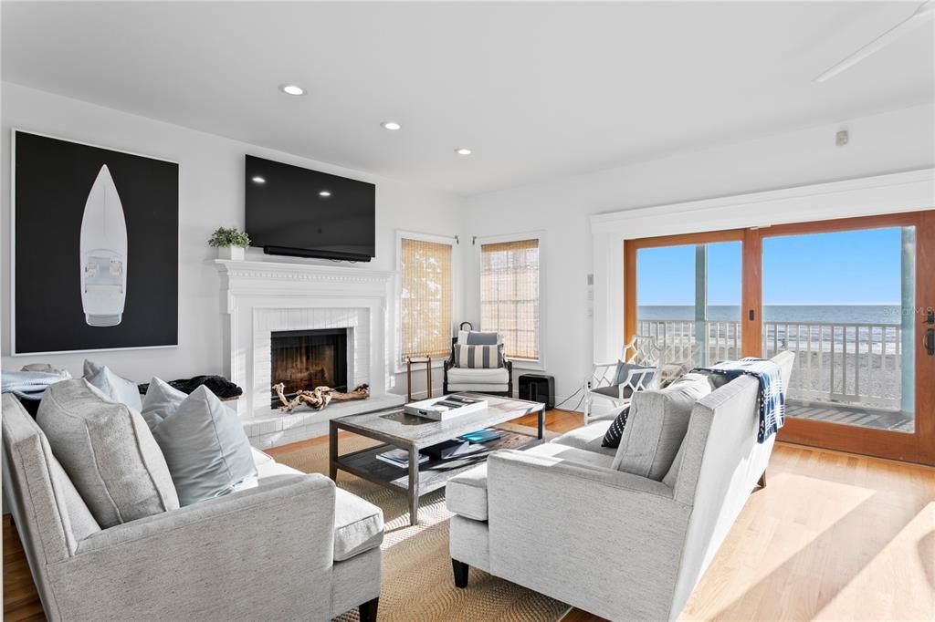 Fireplace, Interior, Living room, Recessed Lighting, Water, Wood Texture Flooring