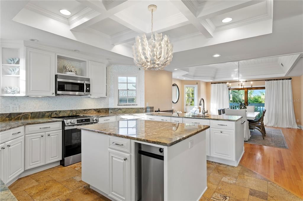 Chandelier, Dining room, Interior, Kitchen, Pendant Lights, Recessed Lighting, Stainless Steel Appliances, Wood Texture Flooring