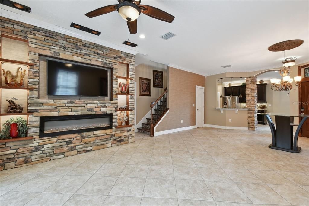 Chandelier, Dining room, Empty room, Fireplace, Interior, Kitchen, Recessed Lighting, Stone Walls