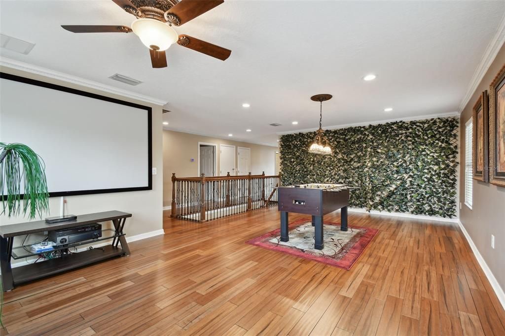 Billiard Table, Game Room, Interior, Pendant Lights, Projection Screen, Recessed Lighting, Wood Texture Flooring