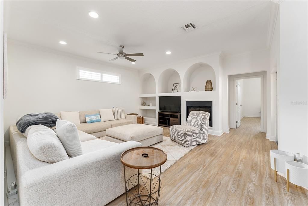 Fireplace, Interior, Living room, Recessed Lighting, Wood Texture Flooring