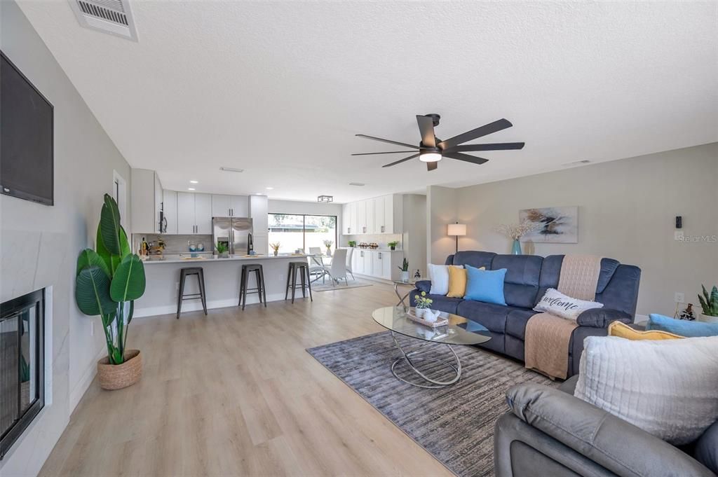 Fireplace, Interior, Kitchen, Living room, Recessed Lighting, Wood Texture Flooring