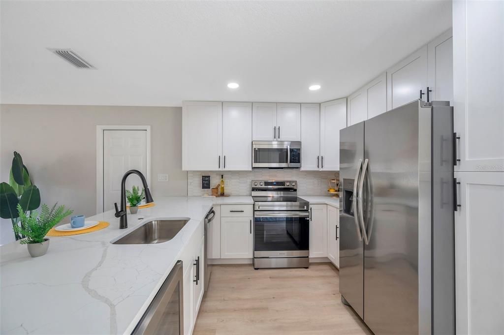 Interior, Kitchen, Recessed Lighting, Stainless Steel Appliances, Wood Texture Flooring