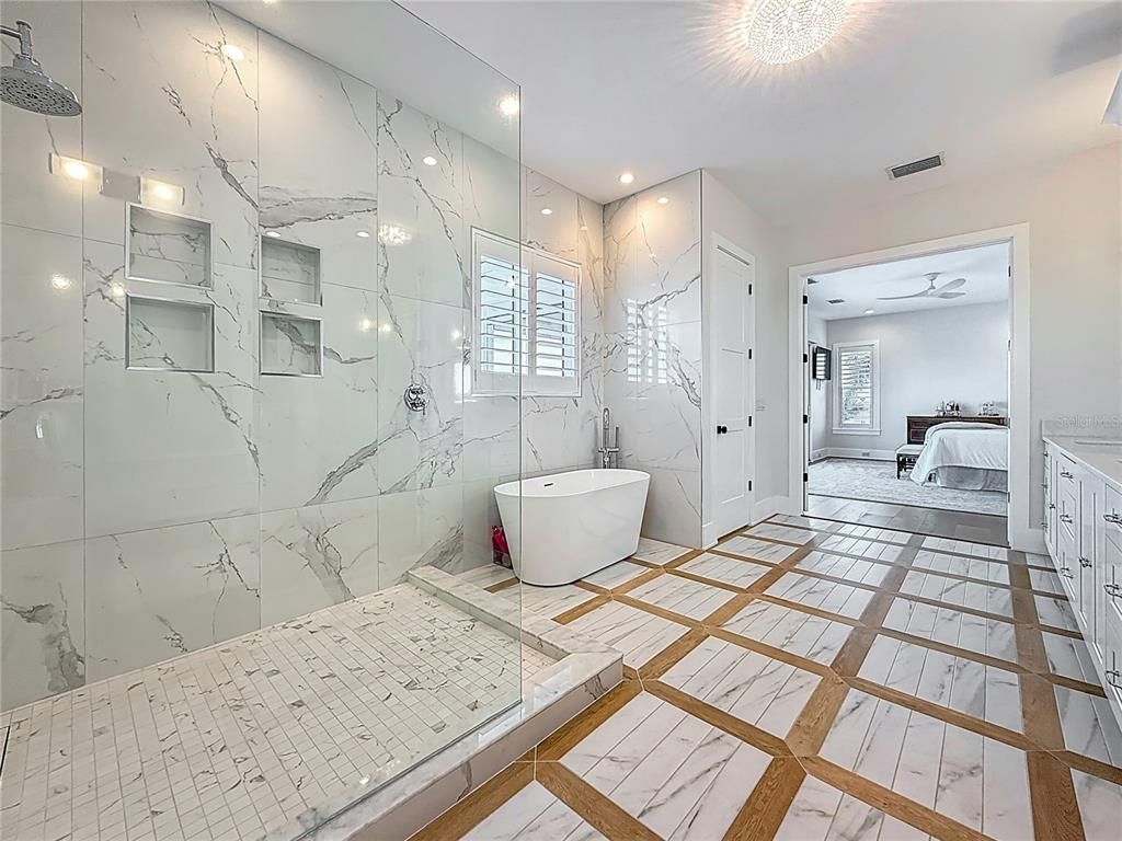 Bathroom, Bedroom, Free Standing Baths, Glass Shower, Interior, Marble, Marble Walls, Recessed Lighting