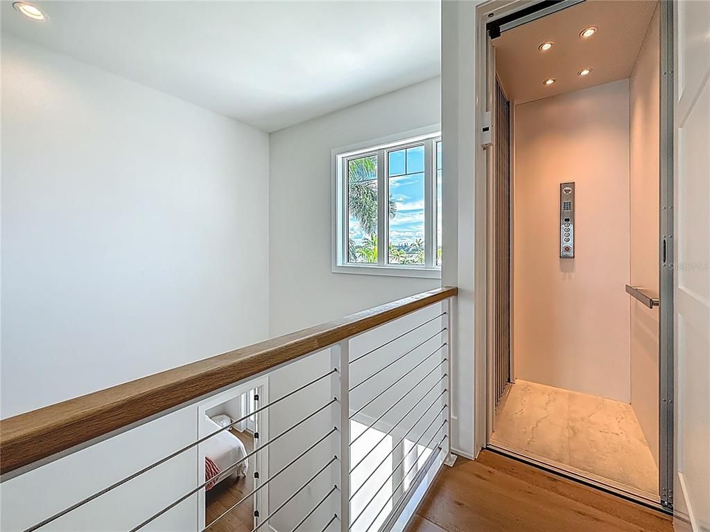 Elevator, Interior, Recessed Lighting, Wood Texture Flooring