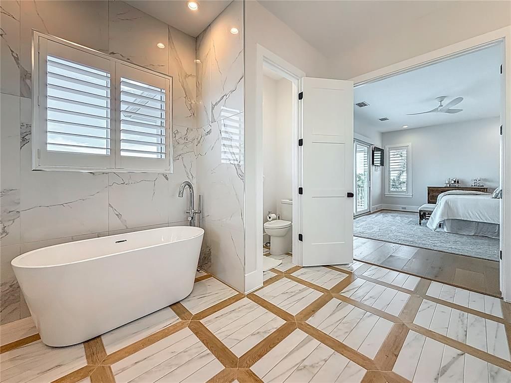 Bathroom, Bedroom, Free Standing Baths, Interior, Marble, Marble Walls, Recessed Lighting