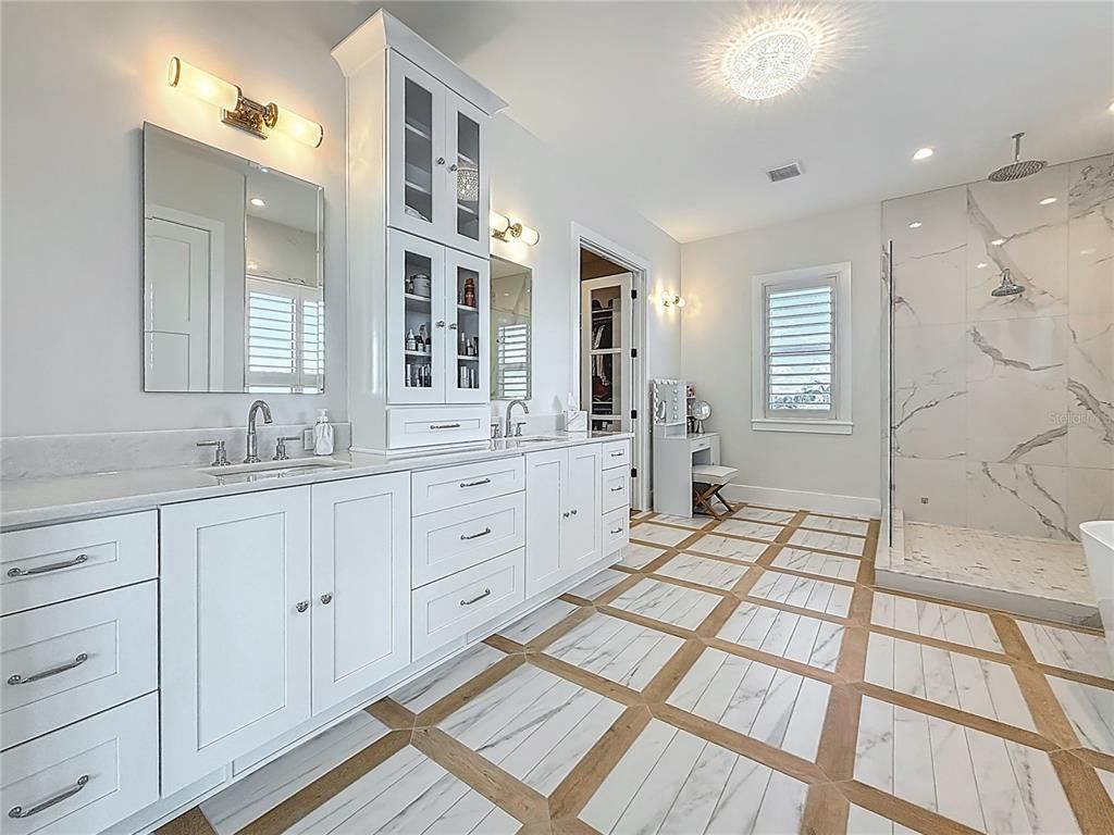 Bathroom, Dual Sink Vanities, Glass Shower, Interior, Marble, Marble Walls, Recessed Lighting