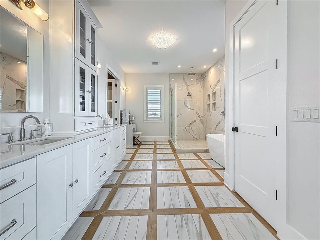 Bathroom, Dual Sink Vanities, Glass Shower, Interior, Marble, Marble Walls, Recessed Lighting