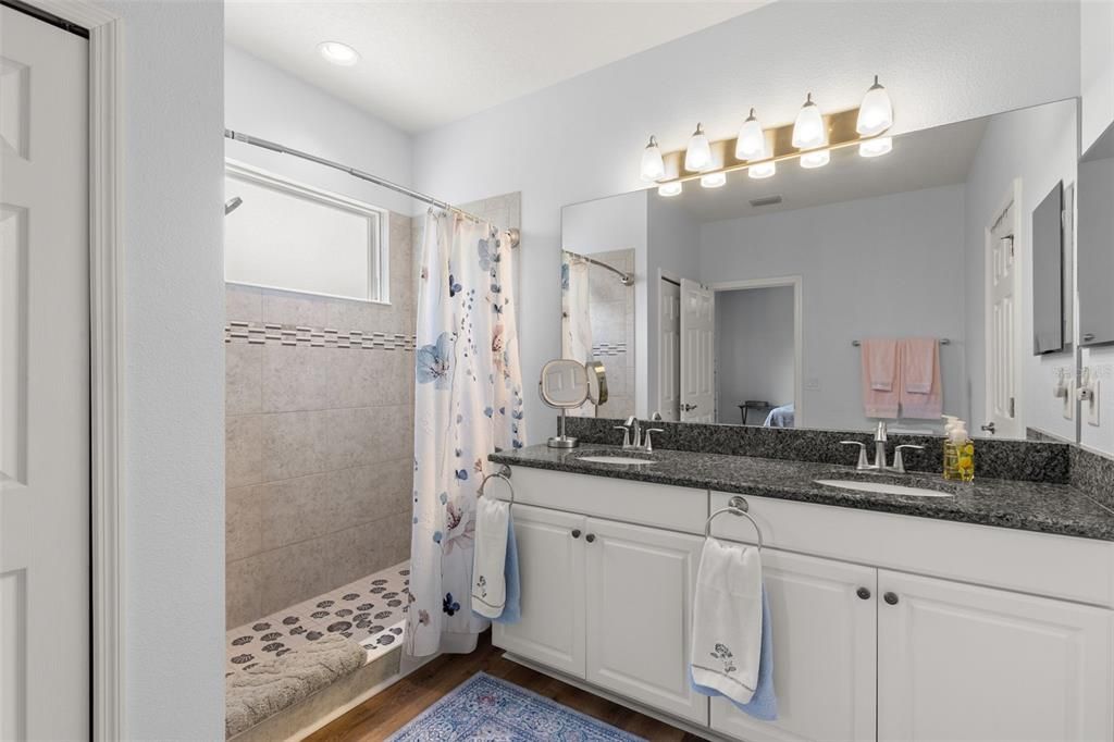 Bathroom, Dual Sink Vanities, Interior, Recessed Lighting, Wood Texture Flooring
