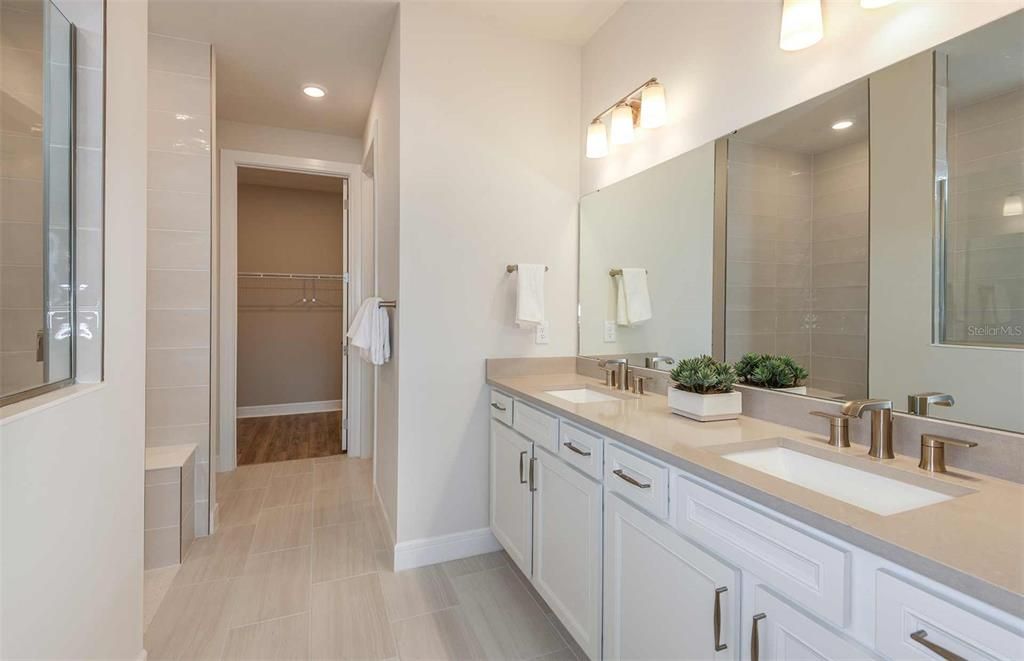 Bathroom, Dual Sink Vanities, Interior, Recessed Lighting, Walk-in Closets, Wood Texture Flooring