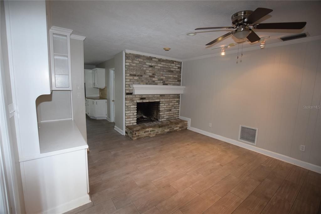 Empty room, Fireplace, Interior, Stone Walls, Wood Texture Flooring