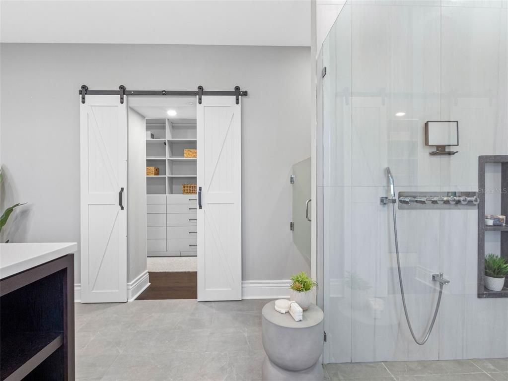 Bathroom, Glass Shower, Interior, Recessed Lighting, Walk-in Closets, Wood Texture Flooring