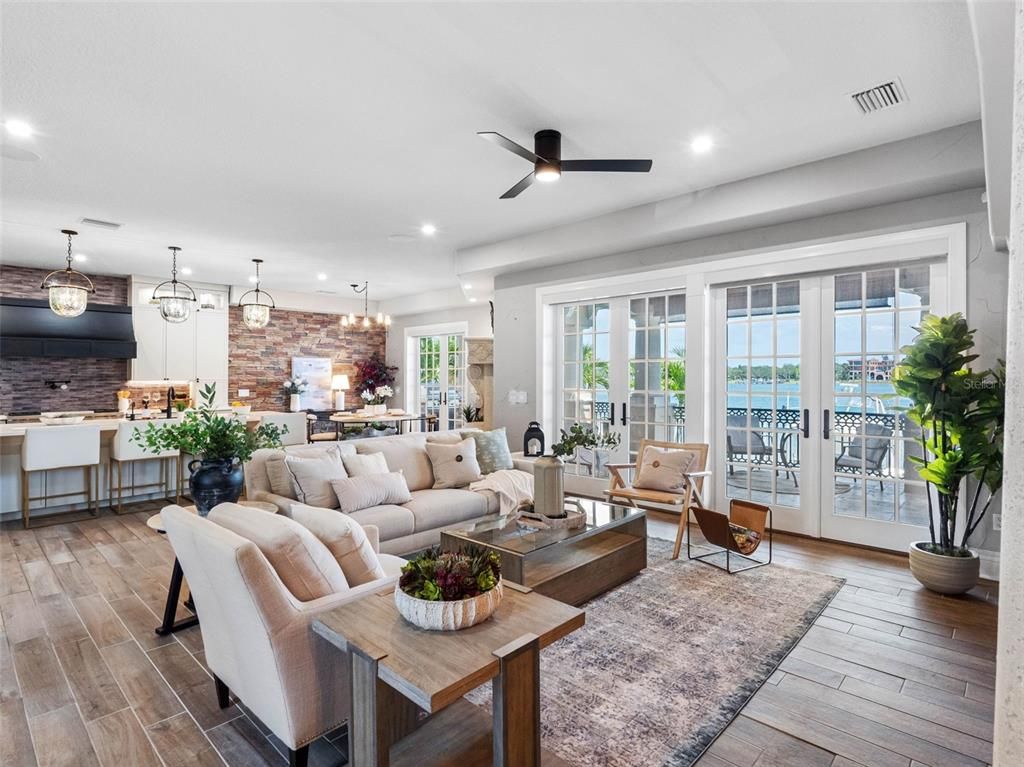 Dining room, Interior, Kitchen, Living room, Pendant Lights, Recessed Lighting, Stone Walls, Wood Texture Flooring