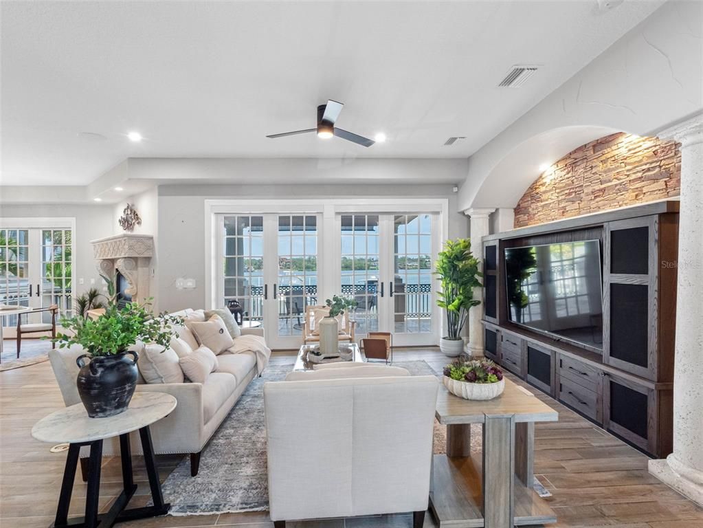 Fireplace, Interior, Living room, Recessed Lighting, Stone Walls, Wood Texture Flooring