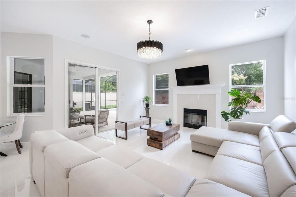 Chandelier, Fireplace, Interior, Living room, Recessed Lighting