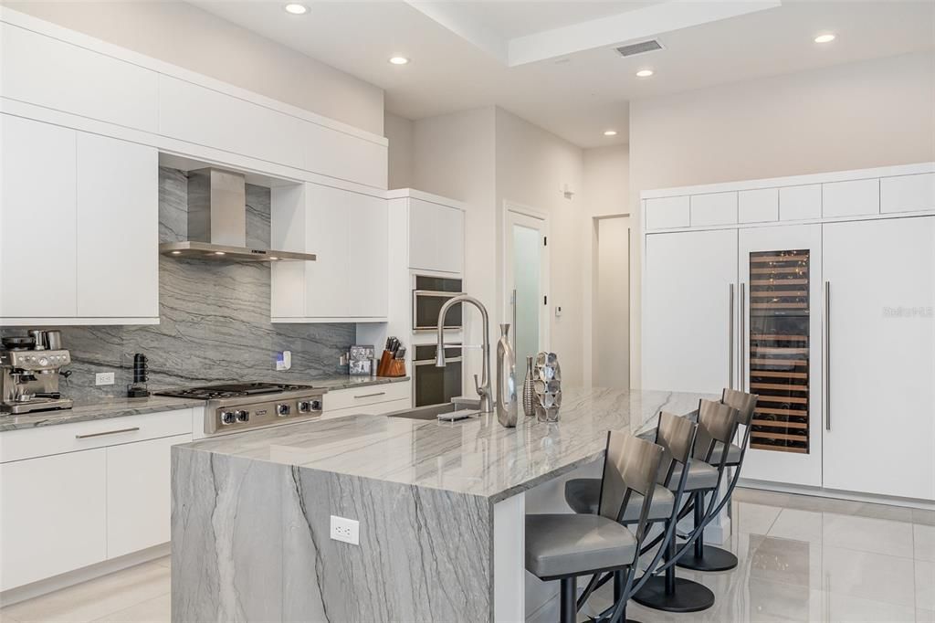 Interior, Kitchen, Marble Walls, Recessed Lighting, Stainless Steel Appliances