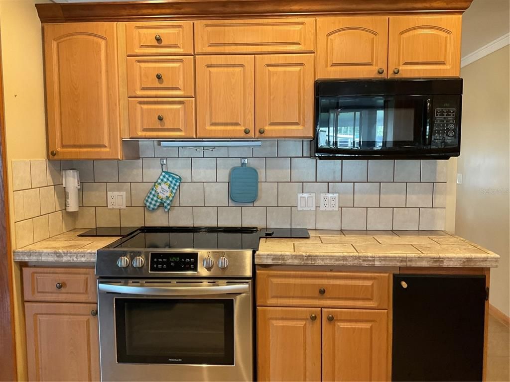 Interior, Kitchen, Stainless Steel Appliances, Tile Countertops