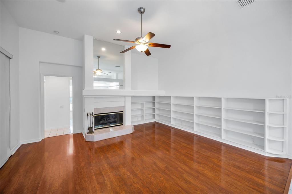 Empty room, Fireplace, Interior, Recessed Lighting, Wood Texture Flooring