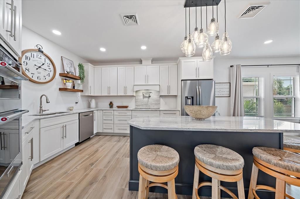 Interior, Kitchen, Pendant Lights, Recessed Lighting, Stainless Steel Appliances, Wood Texture Flooring