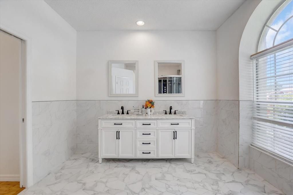 Bathroom, Dual Sink Vanities, Interior, Marble, Marble Walls, Recessed Lighting