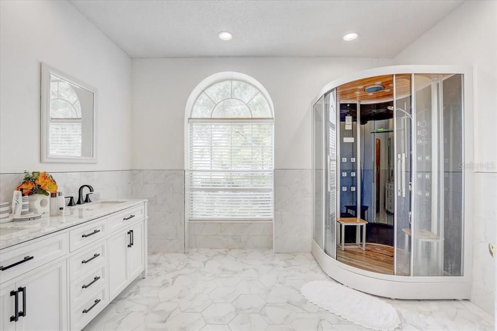 Bathroom, Dual Sink Vanities, Interior, Marble, Marble Walls, Recessed Lighting