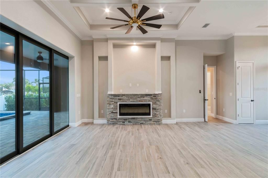 Empty room, Fireplace, Interior, Recessed Lighting, Wood Texture Flooring
