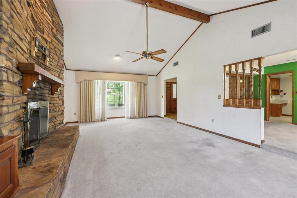 Empty room, Fireplace, Interior, Recessed Lighting, Stone Walls, Wooden Beams