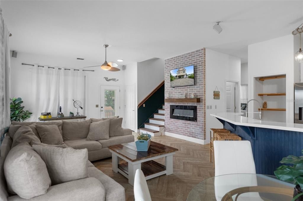 Fireplace, Interior, Kitchen, Living room, Pendant Lights, Recessed Lighting, Stone Walls, Wood Texture Flooring